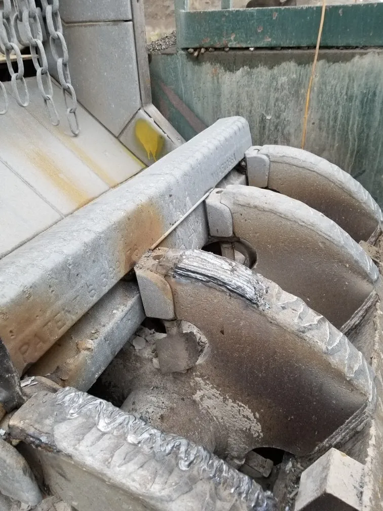 Worn crusher segments, pulled